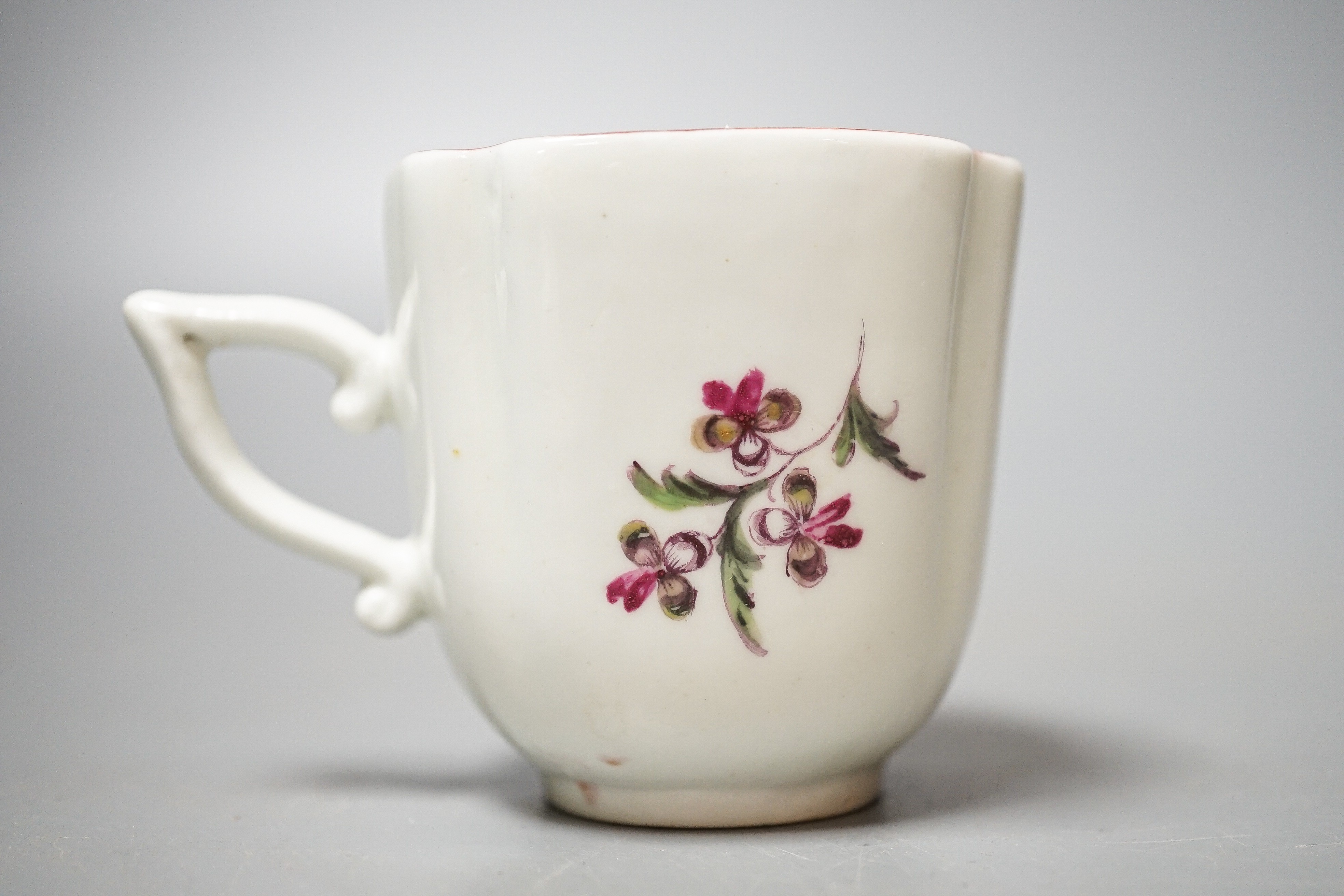 A Derby coffee cup, c.1758, wishbone shaped handle, height 5.7cm